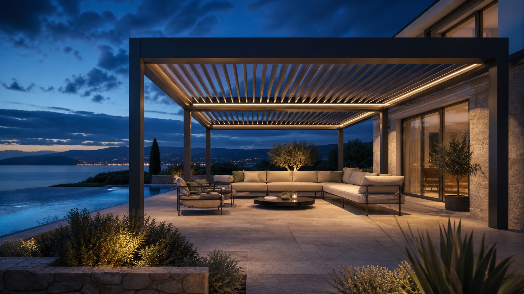 Bioclimatic aluminium pergola over a terrace at dusk